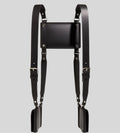 flat lay of leather shoulder harness holster with triple pouch