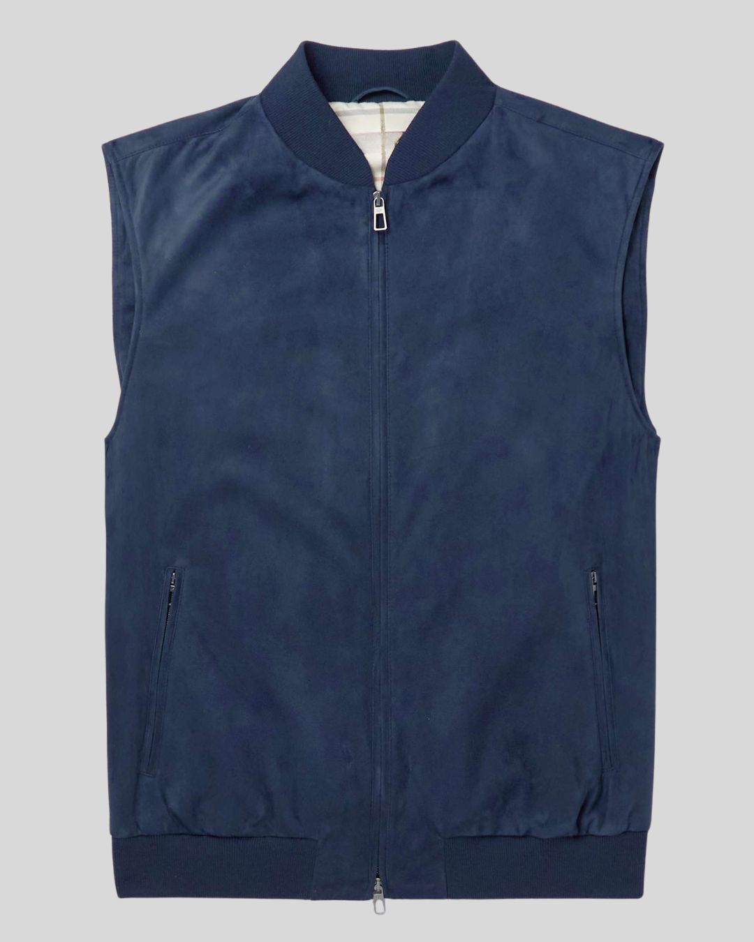 model wearing Navy Loft blue suede vest with beige pants